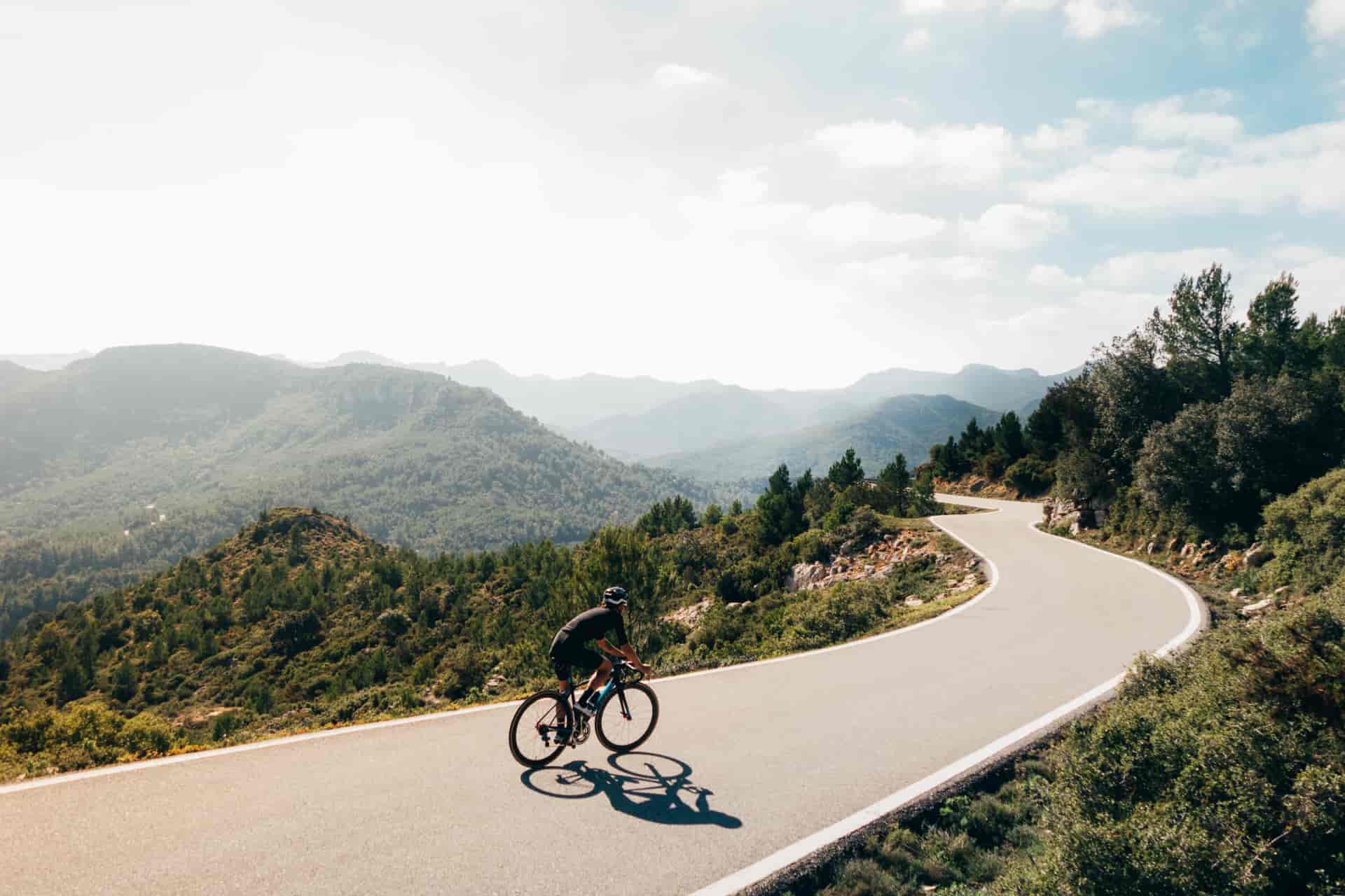 Cyclist on a catalonian mountain road